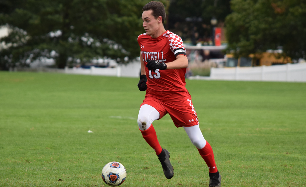 Men's Soccer Secures NECC Bye with Win at Lesley